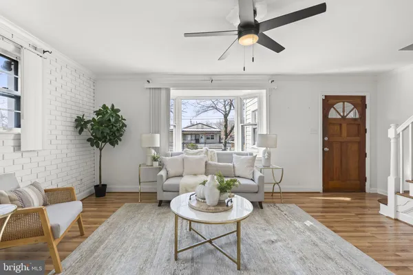 a kitchen with appliances a sink and cabinets