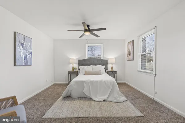 a room with a sink and cabinets