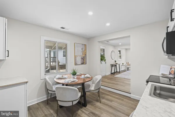 a view of empty room with wooden walls