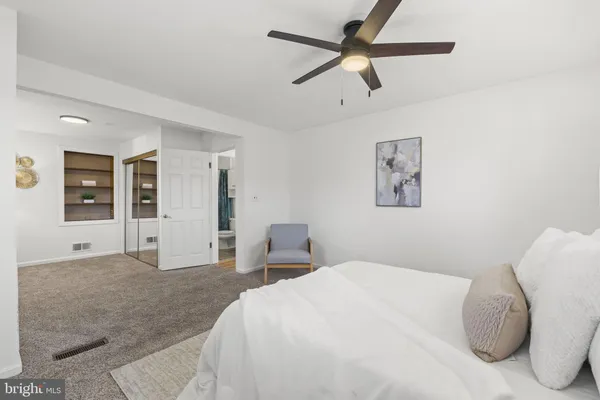 a view of living room with furniture and window