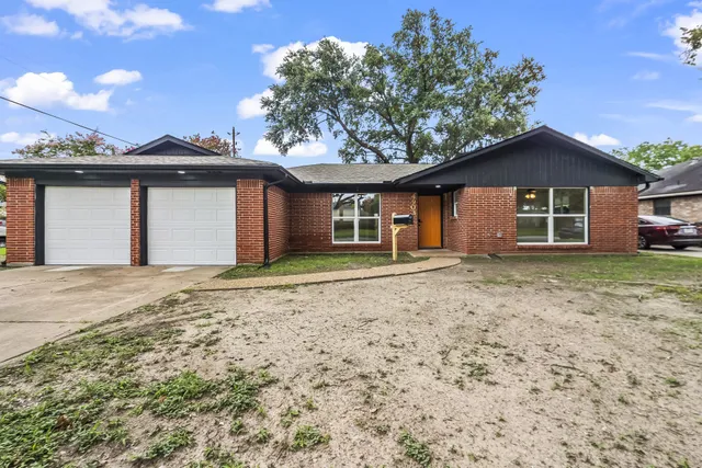 front view of a house with a tiny house