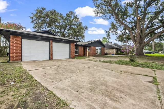 front view of a house with a street