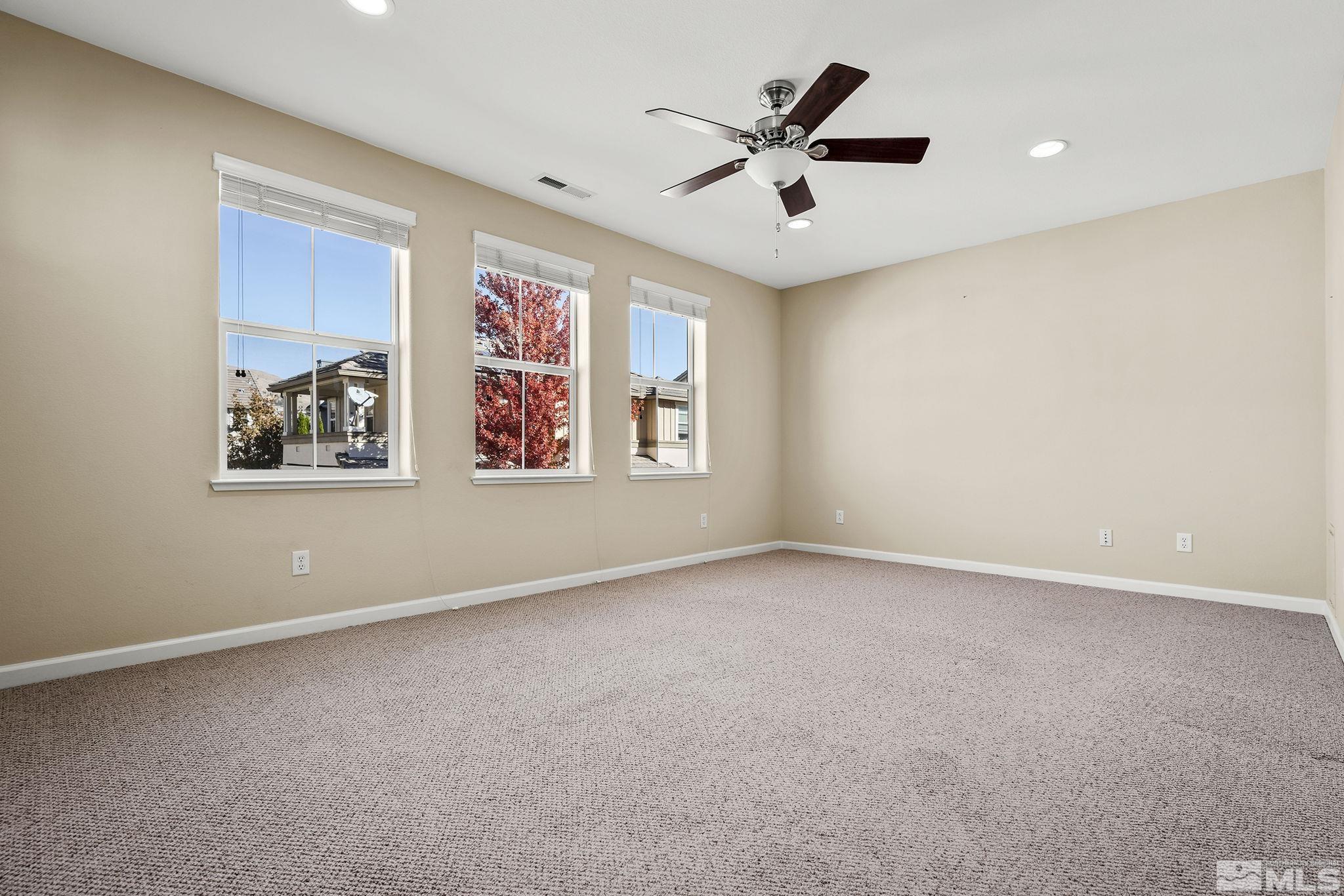 7688 Stone Bluff Way Reno, NV 89523 - Photo 13 of 26 a view of an empty room with a window