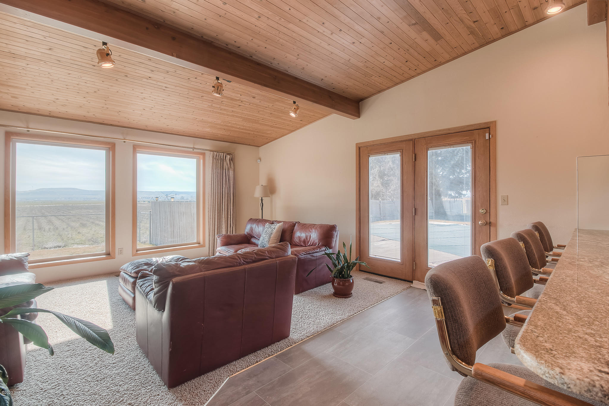 4970 Hudson Road Outlook, WA 98938 - Photo 11 of 38 a living room with furniture and large windows