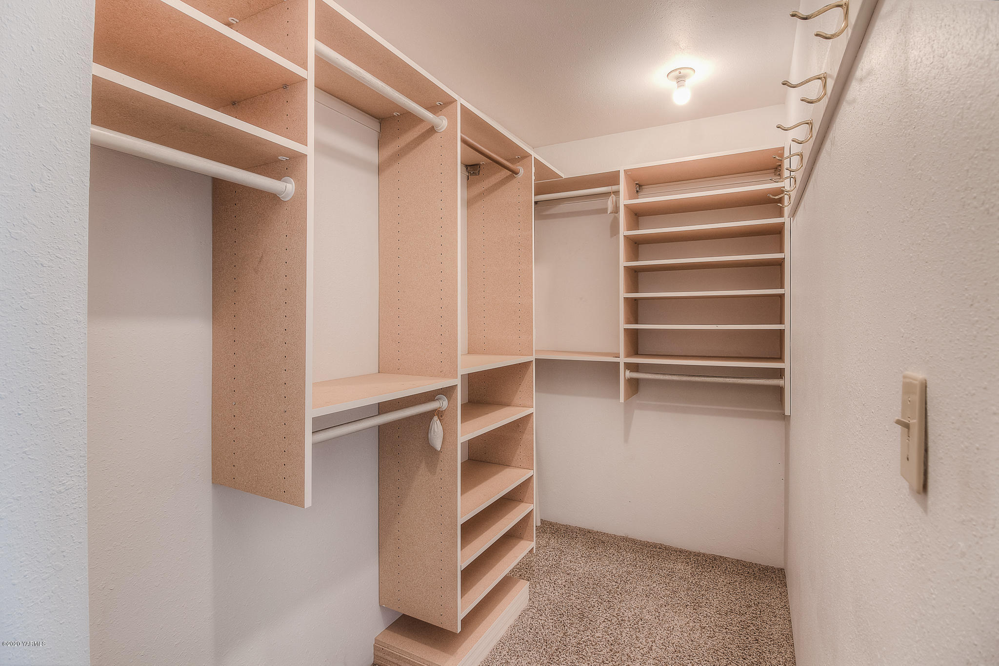 4970 Hudson Road Outlook, WA 98938 - Photo 16 of 38 a view of walk in closet with empty racks