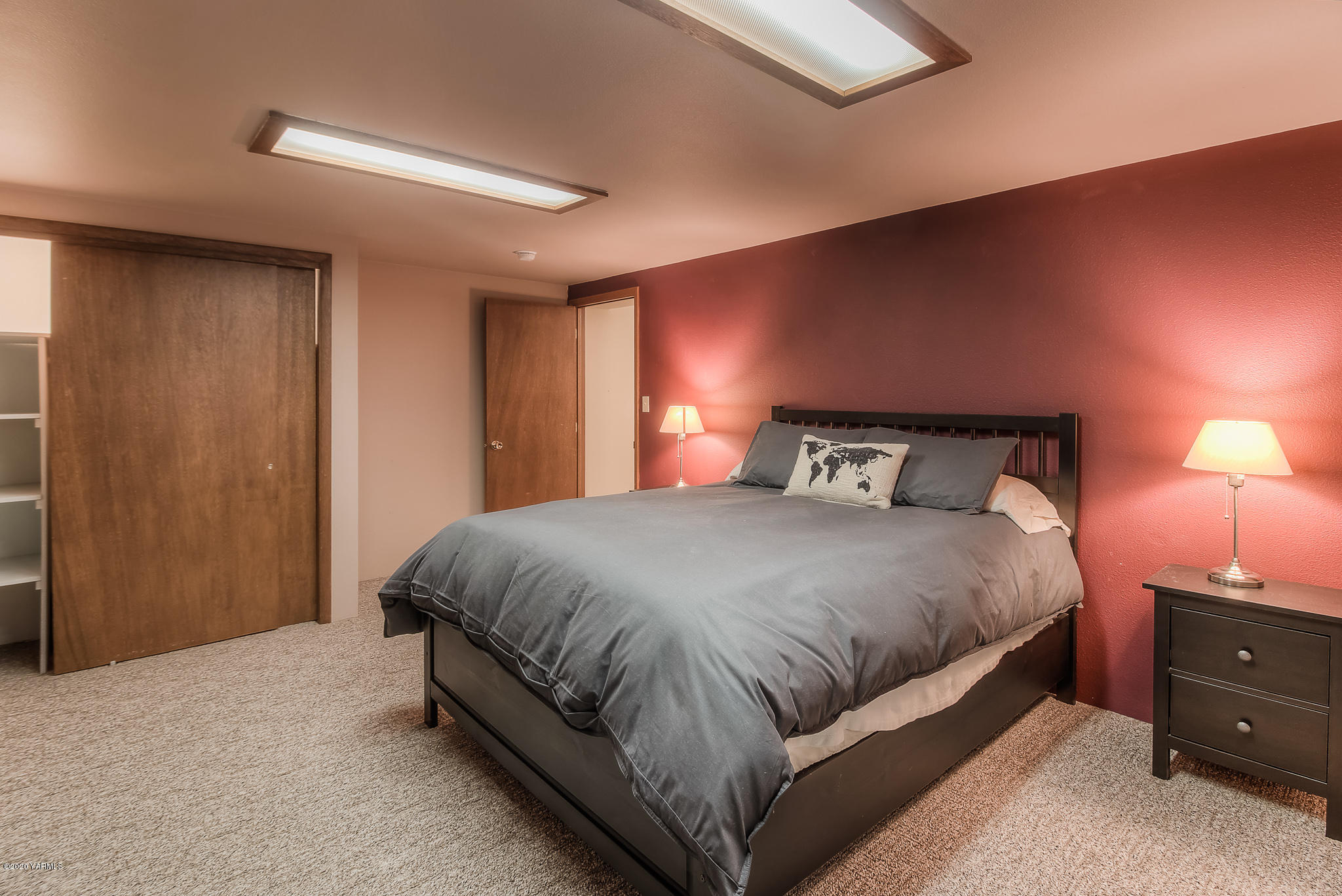 4970 Hudson Road Outlook, WA 98938 - Photo 23 of 38 a bedroom with a bed and a lamp