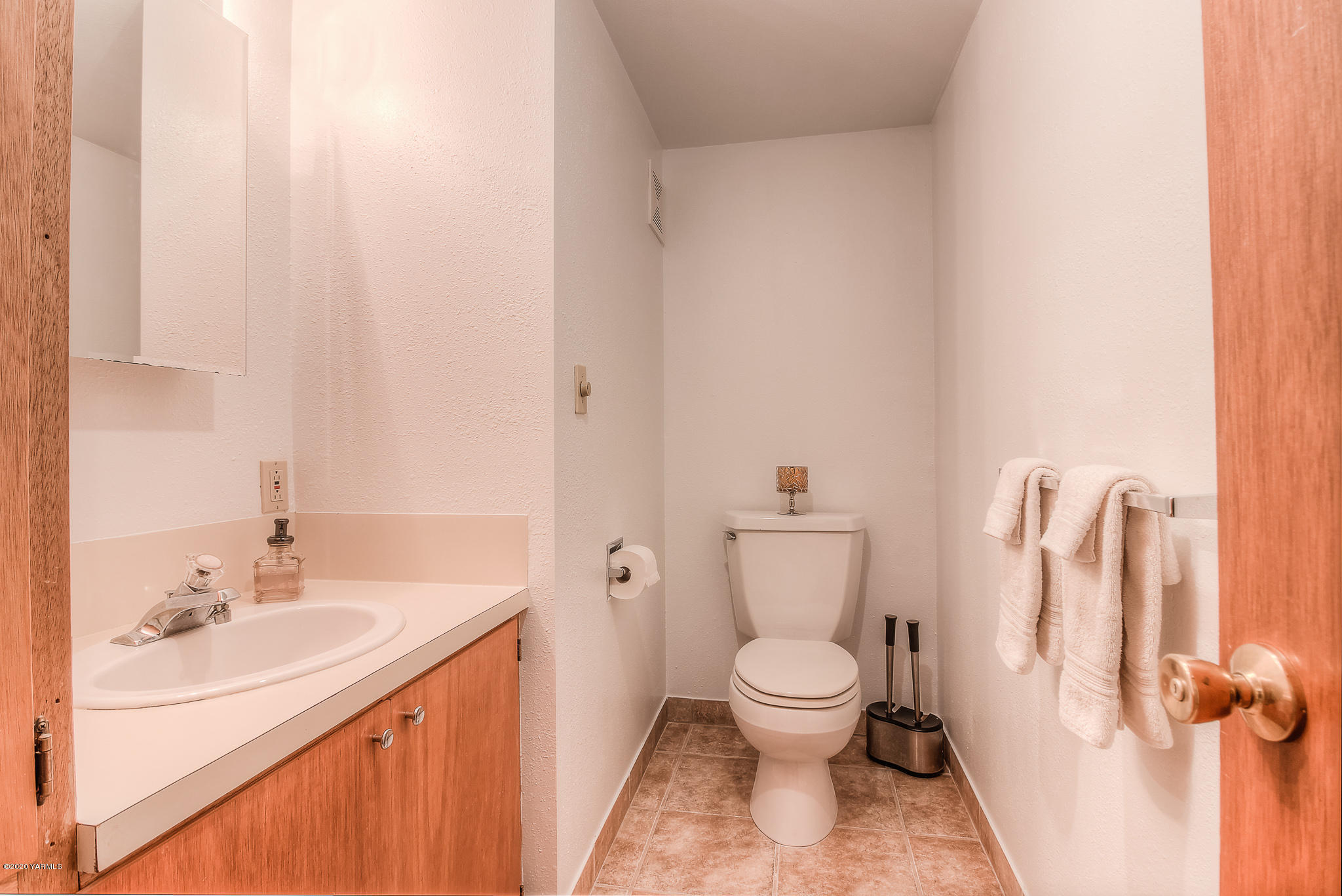 4970 Hudson Road Outlook, WA 98938 - Photo 25 of 38 a white toilet sitting next to a bathroom sink