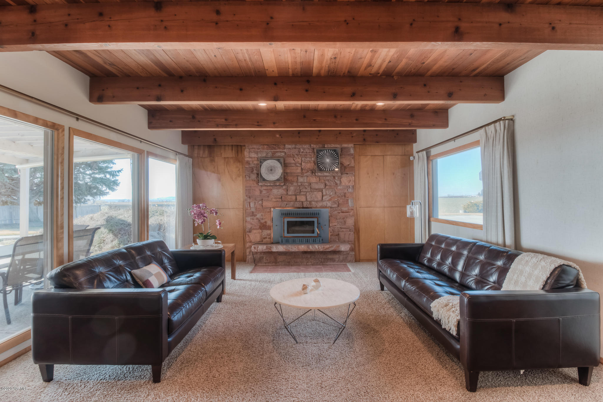 4970 Hudson Road Outlook, WA 98938 - Photo 4 of 38 a living room with furniture and a fireplace