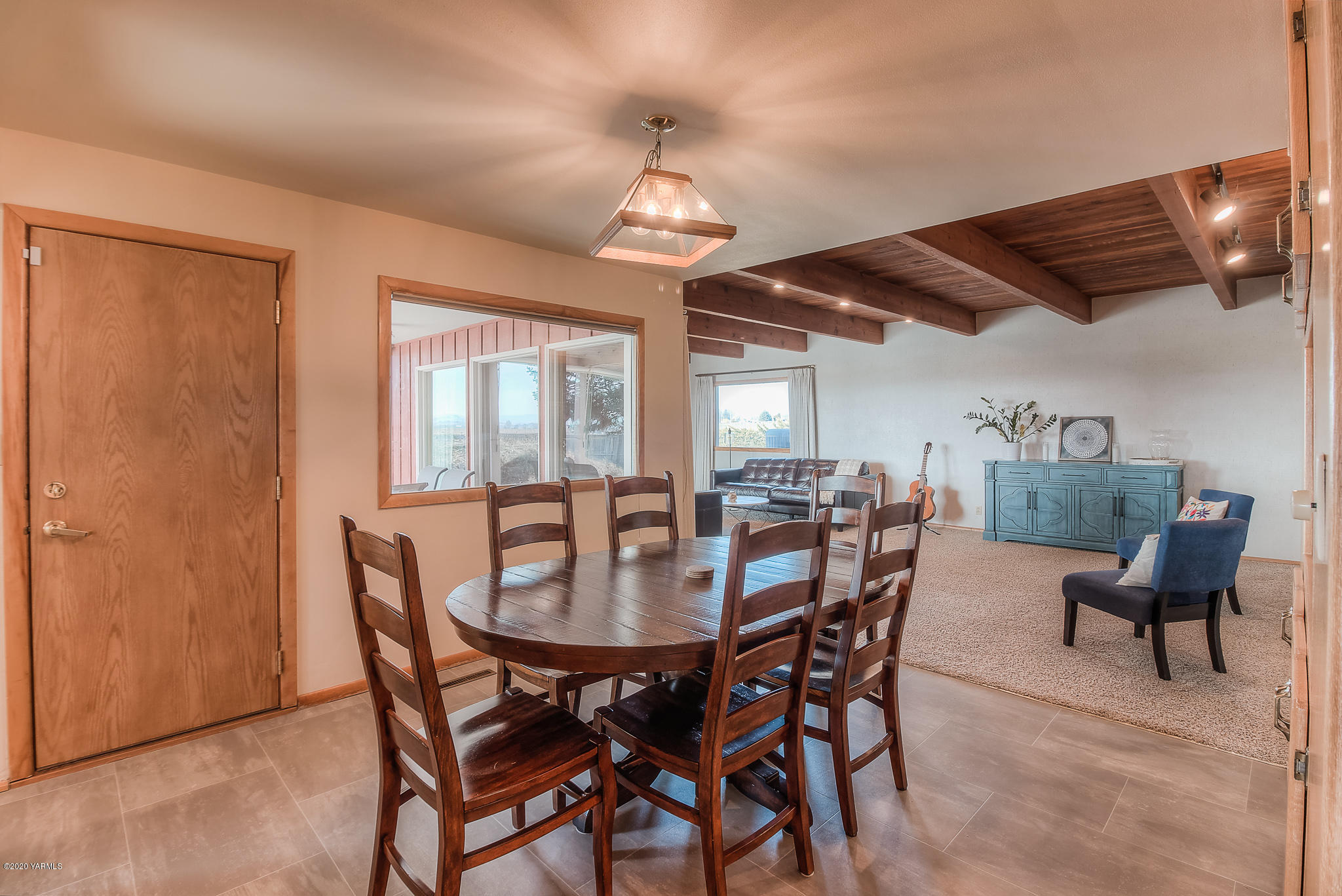 4970 Hudson Road Outlook, WA 98938 - Photo 6 of 38 a dining room with furniture window and wooden floor