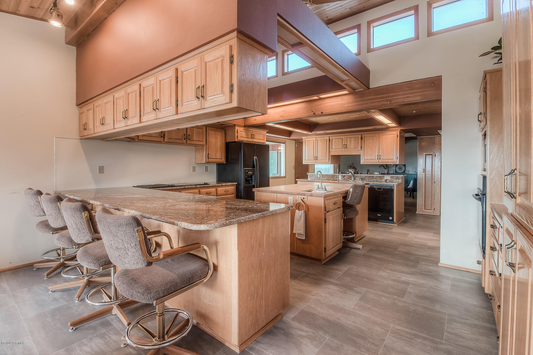4970 Hudson Road Outlook, WA 98938 - Photo 8 of 38 a kitchen with a stove top oven and cabinets