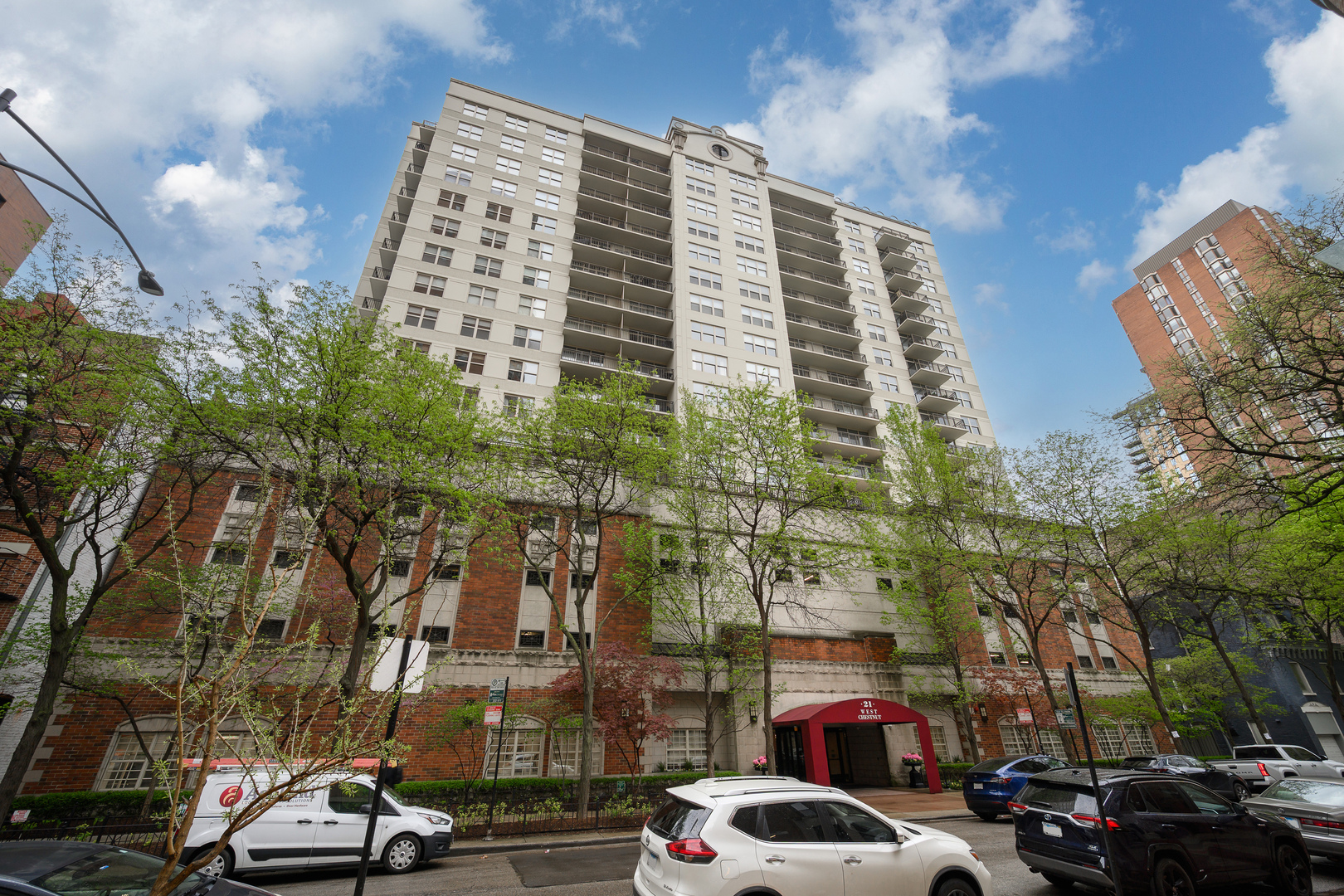 21 West Chestnut Street, Unit 901 Chicago, IL 60610 - Photo 1 of 29 a view of cars parked in front of a building