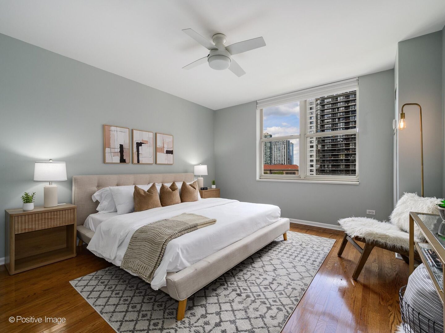 21 West Chestnut Street, Unit 901 Chicago, IL 60610 - Photo 15 of 29 a bedroom with a bed and a window