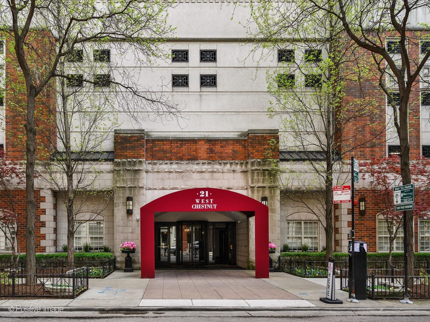 21 West Chestnut Street, Unit 901 Chicago, IL 60610 - Photo 2 of 29 a front view of a building with street