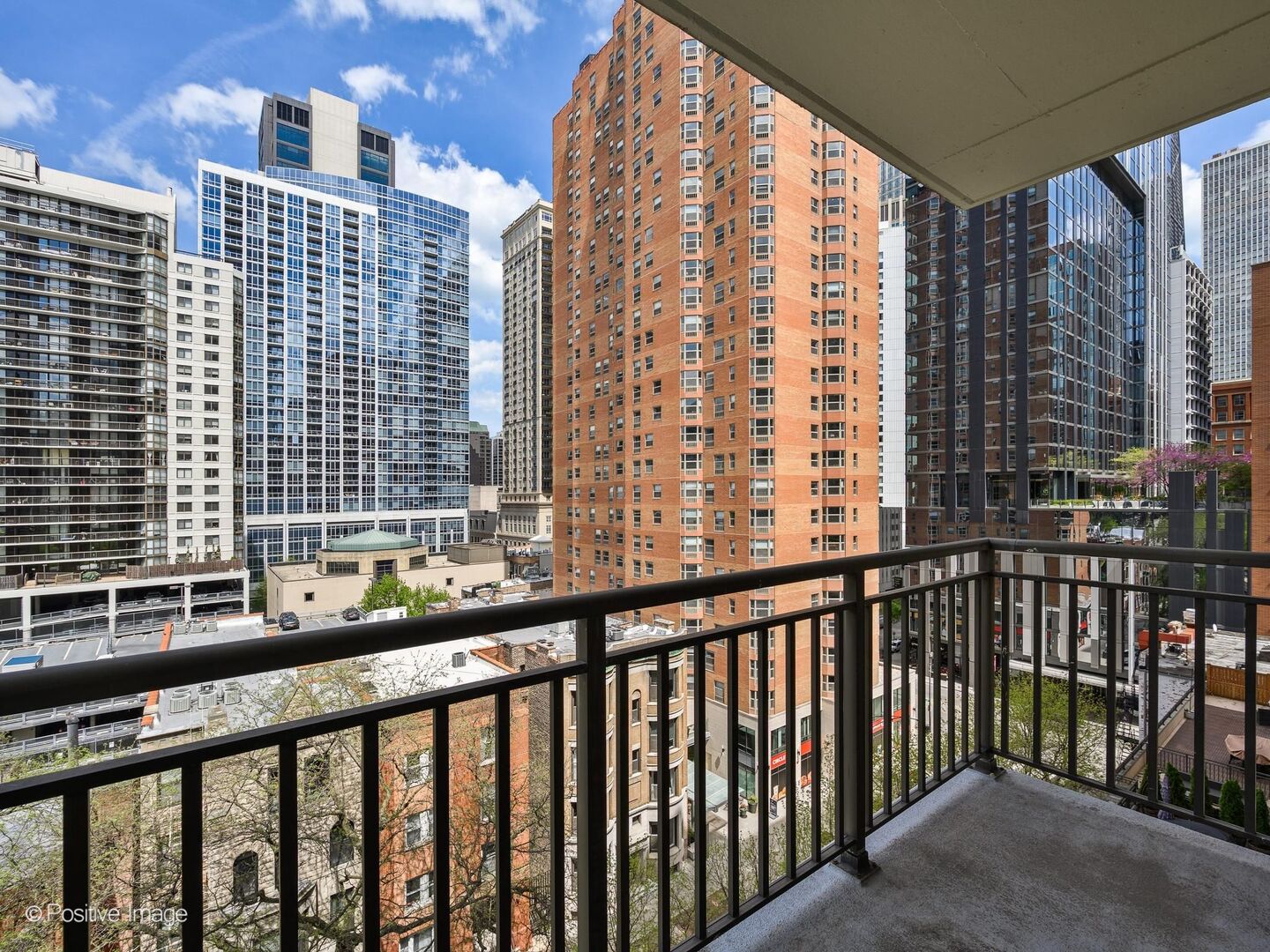 21 West Chestnut Street, Unit 901 Chicago, IL 60610 - Photo 22 of 29 a city view from a balcony