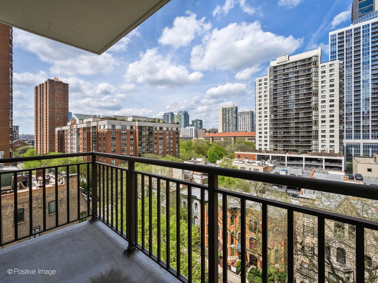 21 West Chestnut Street, Unit 901 Chicago, IL 60610 - Photo 23 of 29 a view of city from a balcony