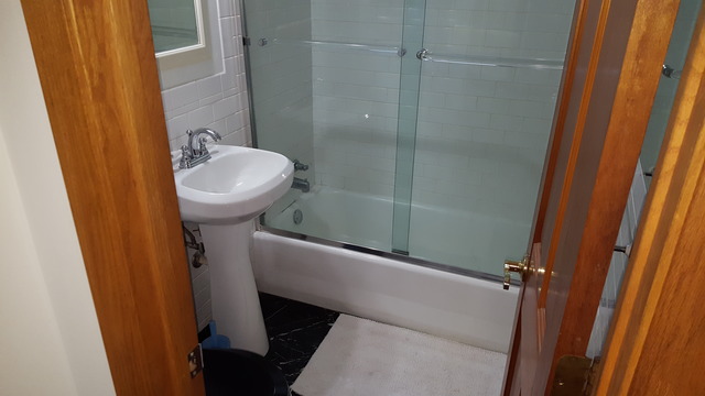 829 North Bennett Street Geneva, IL 60134 - Photo 16 of 20 a bathroom with sink shower and toilet