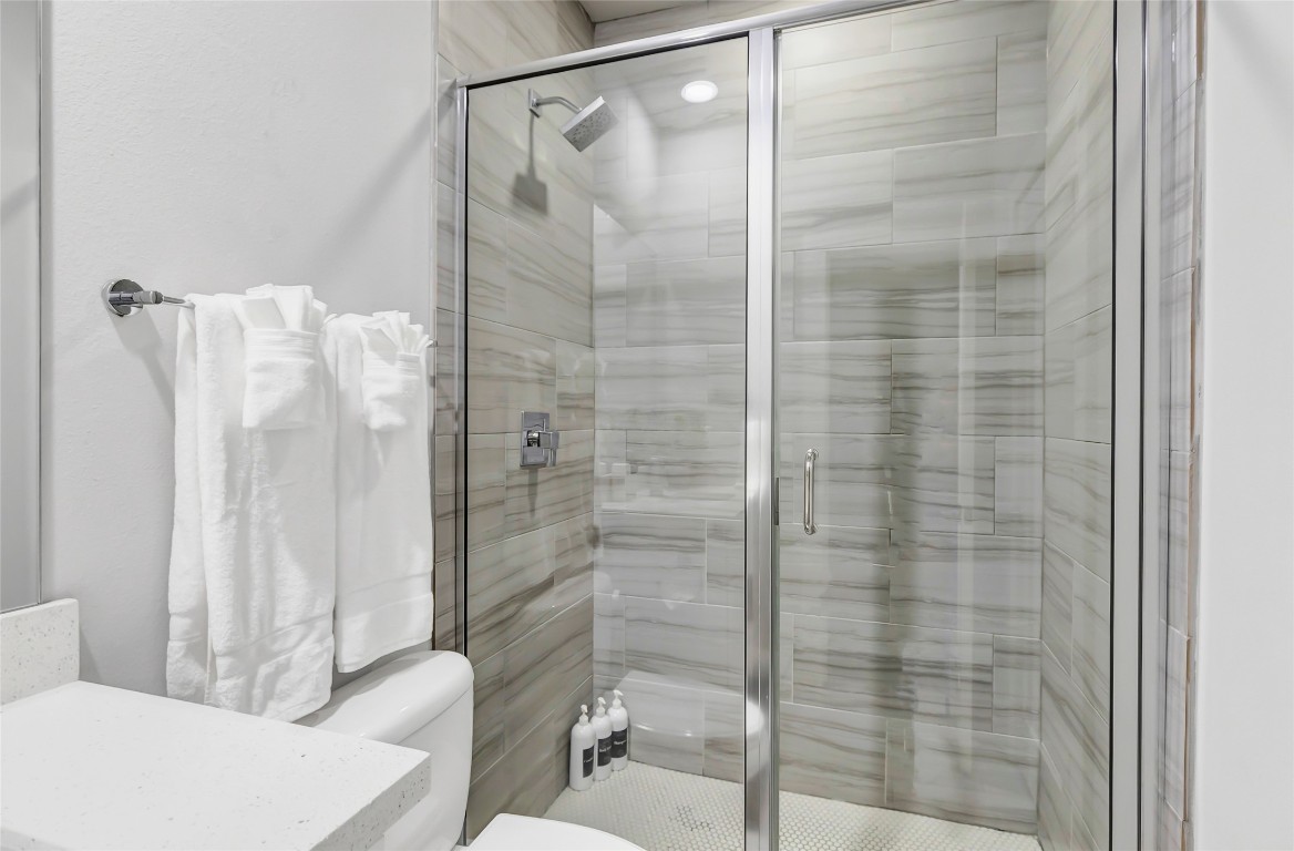 1310 Roberts Street Houston, TX 77003 - Photo 19 of 30 a bathroom with a shower and a toilet