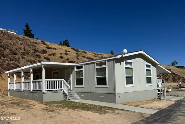 a front view of a house with a garage