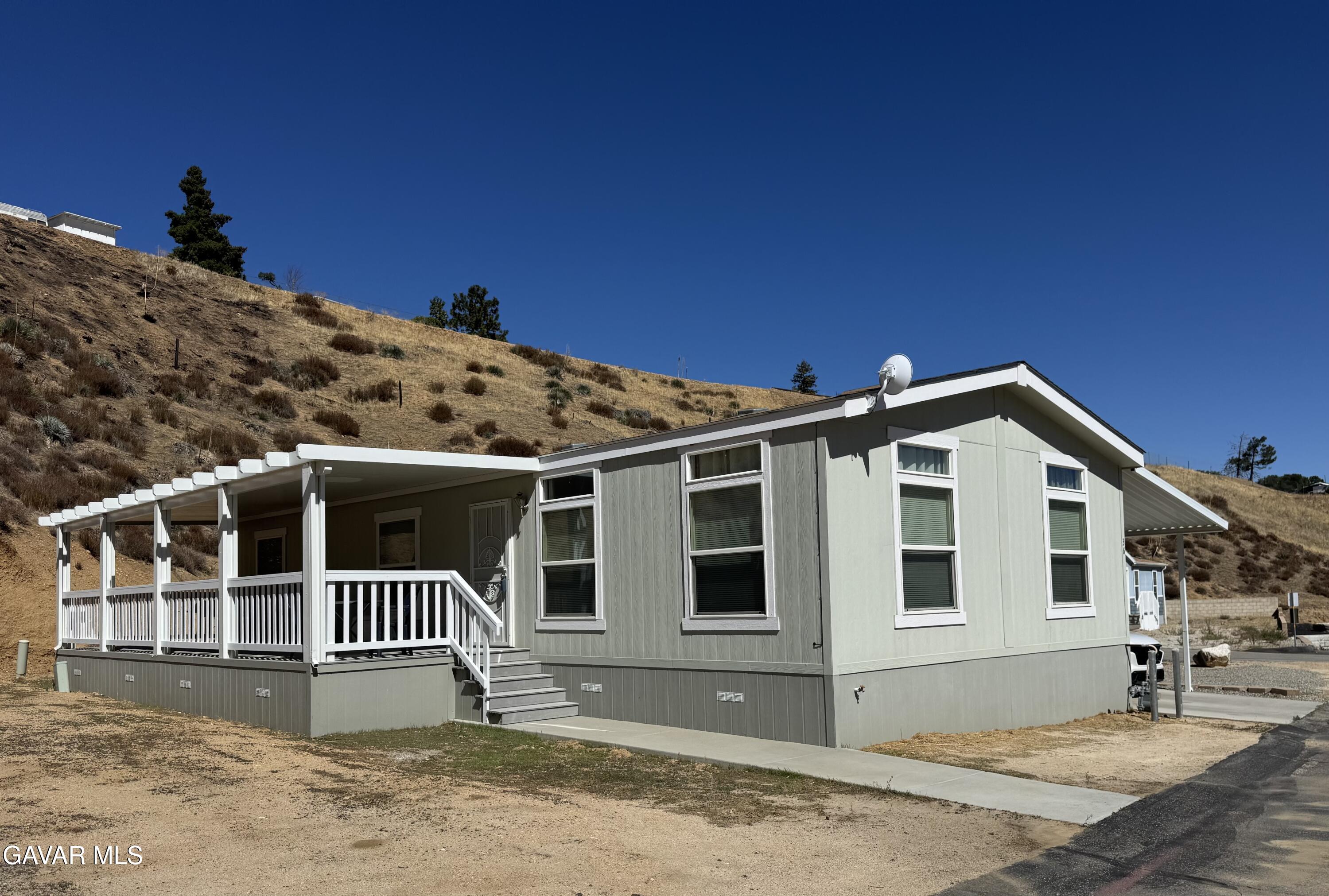 a front view of a house with a garage