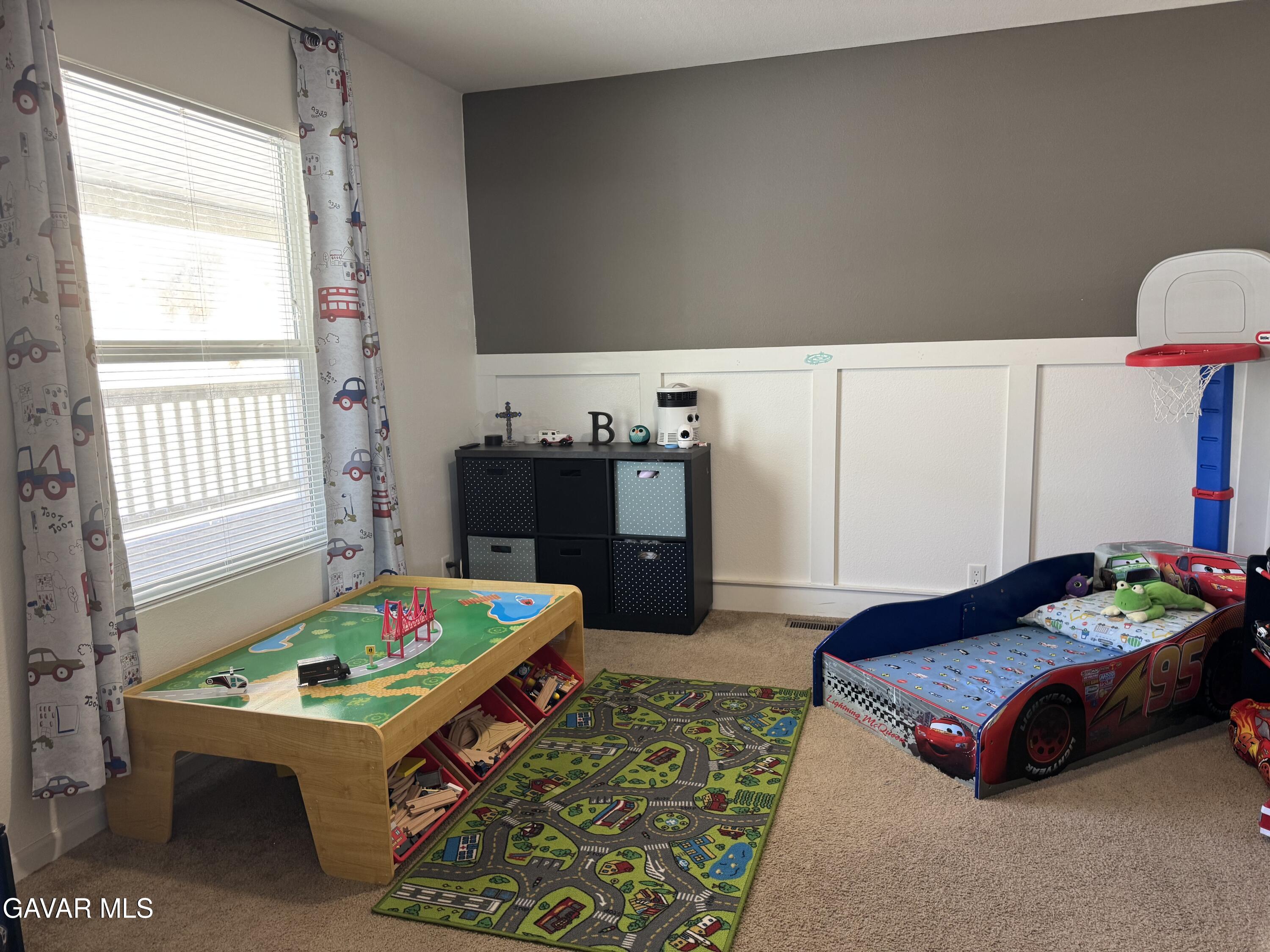 657 Lebec Road Lebec, CA 93243 - Photo 13 of 18 a bedroom with a bed and a table in it