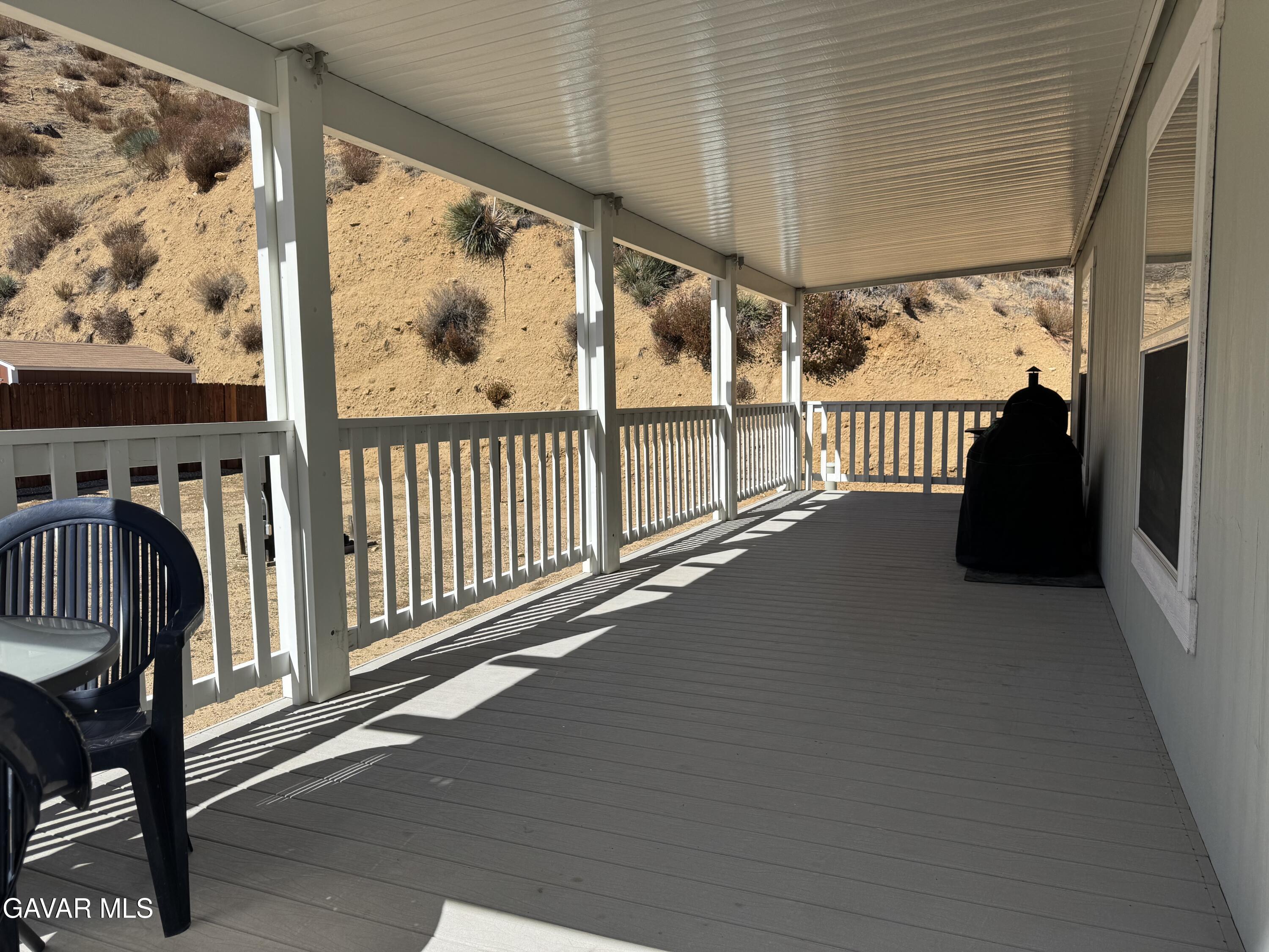 657 Lebec Road Lebec, CA 93243 - Photo 15 of 18 a view of a porch with wooden floor and outdoor space