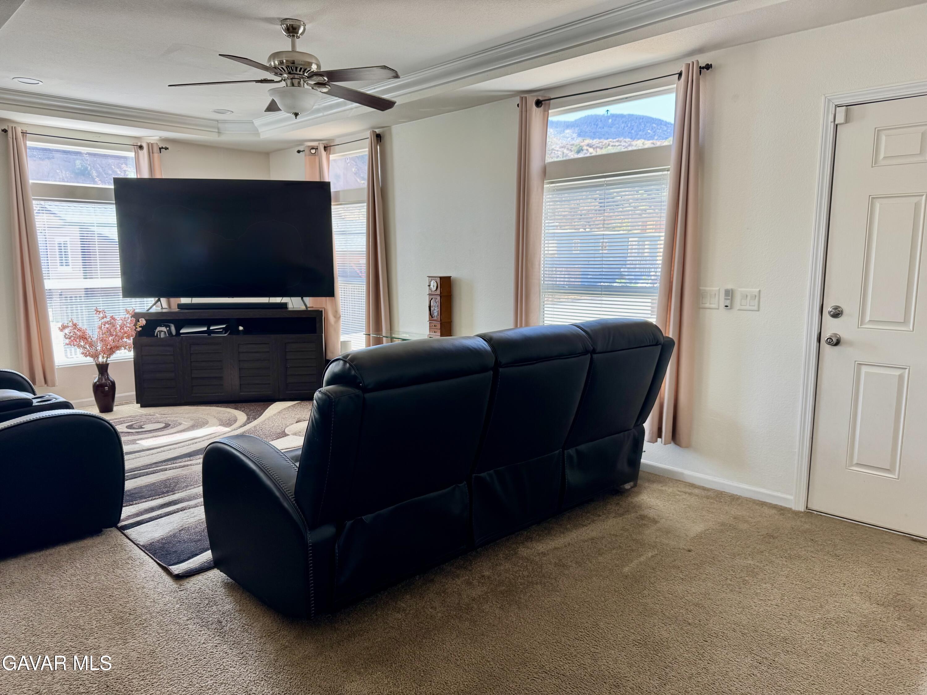 657 Lebec Road Lebec, CA 93243 - Photo 3 of 18 a living room with furniture and a flat screen tv