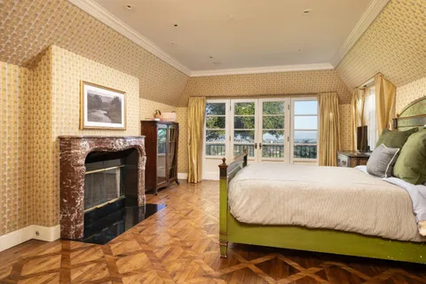 a large spacious bathroom with a large tub and shower