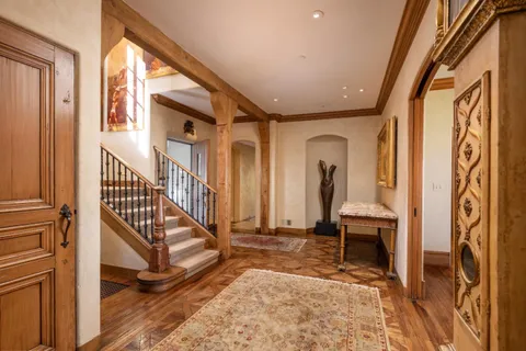 a view of front door with stairs