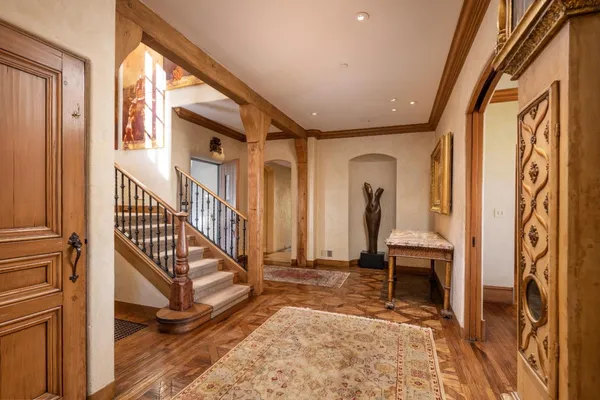 a view of front door with stairs