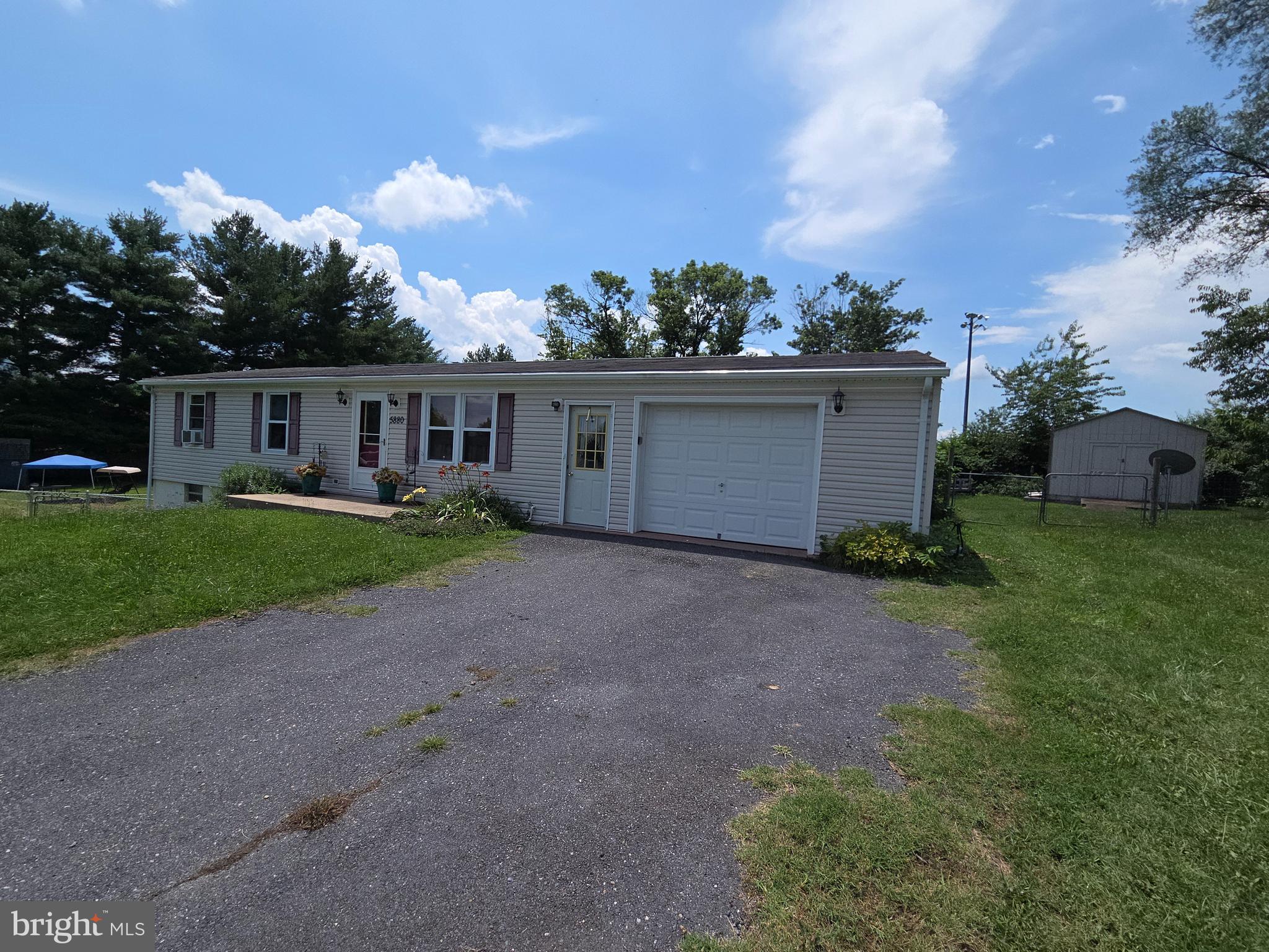 5880 Cardinal Street Mount Jackson, VA 22842 - Photo 2 of 44 a view of a house with a yard and fence