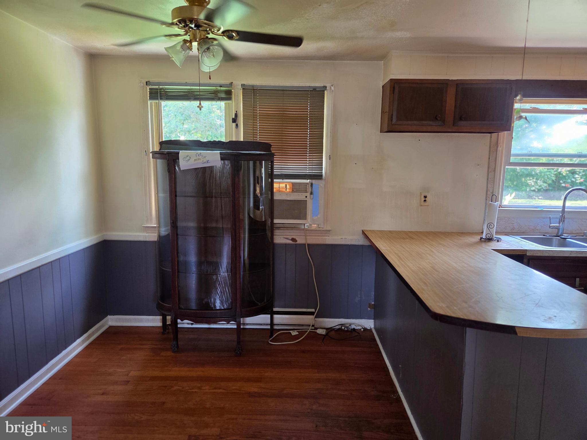 5880 Cardinal Street Mount Jackson, VA 22842 - Photo 25 of 44 a room with wooden floor and furniture