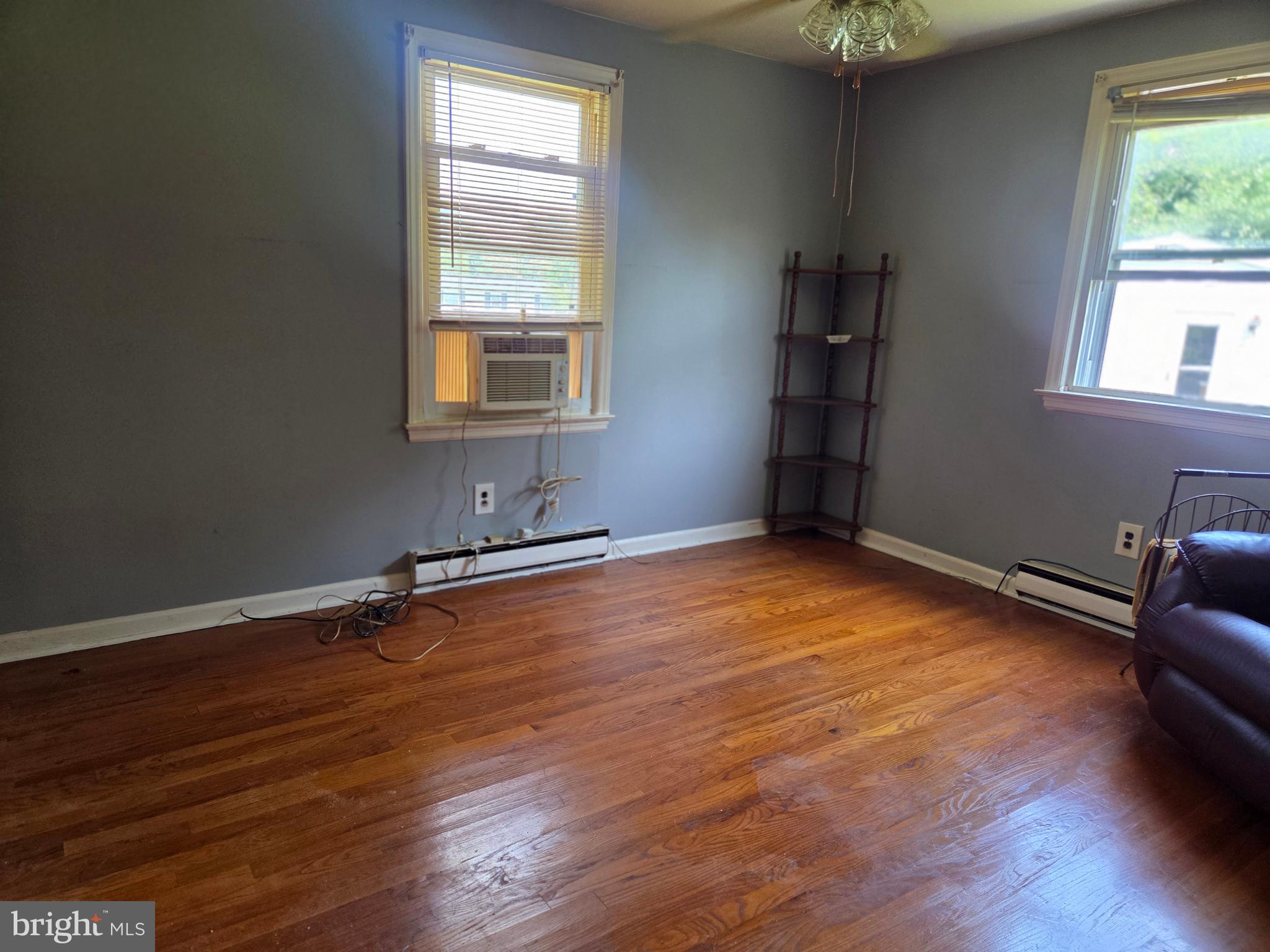 5880 Cardinal Street Mount Jackson, VA 22842 - Photo 30 of 44 a view of a room with wooden floor and window
