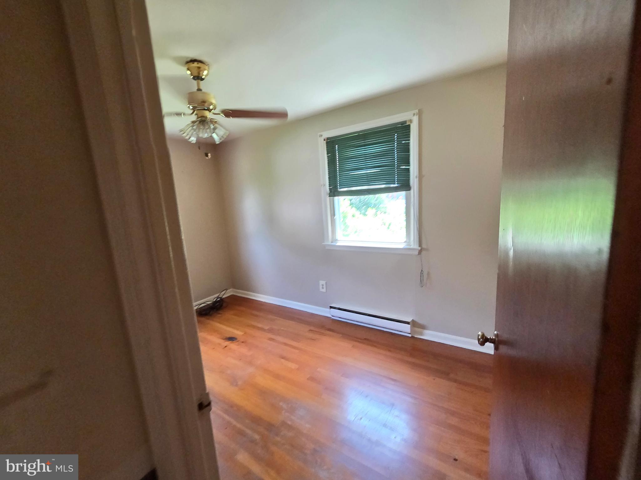5880 Cardinal Street Mount Jackson, VA 22842 - Photo 35 of 44 an empty room with a door