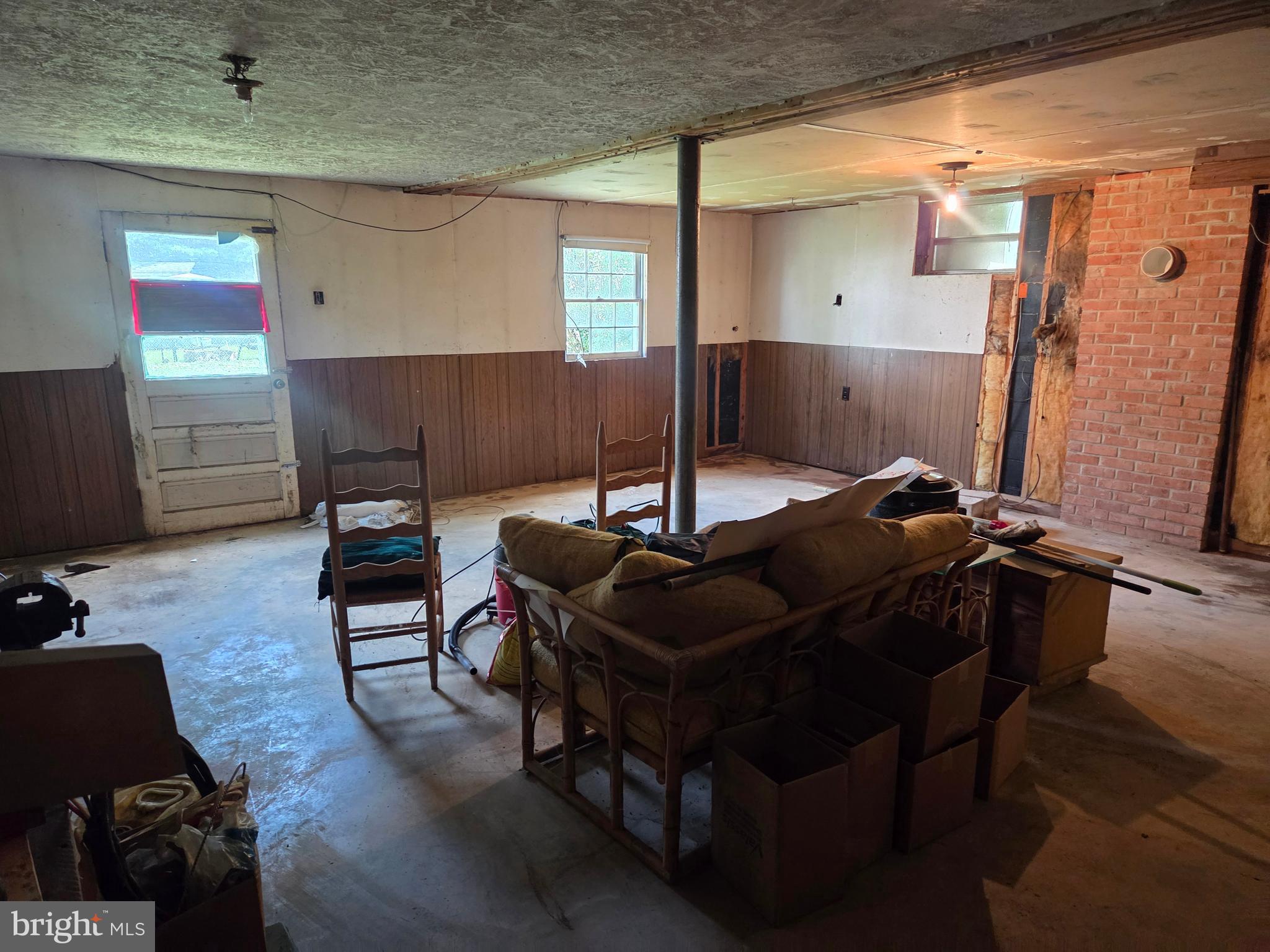 5880 Cardinal Street Mount Jackson, VA 22842 - Photo 40 of 44 a living room with furniture and a flat screen tv