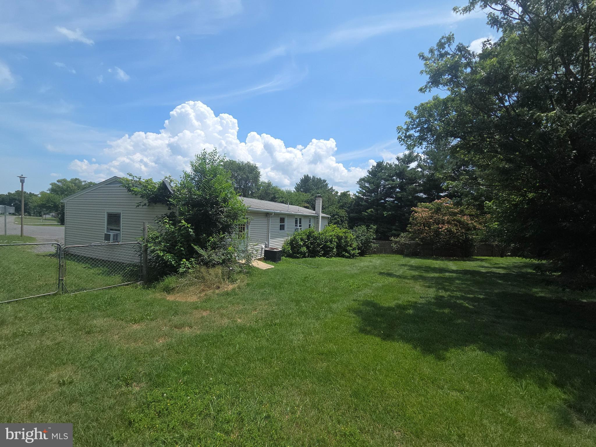 5880 Cardinal Street Mount Jackson, VA 22842 - Photo 4 of 44 a front view of a house with a yard