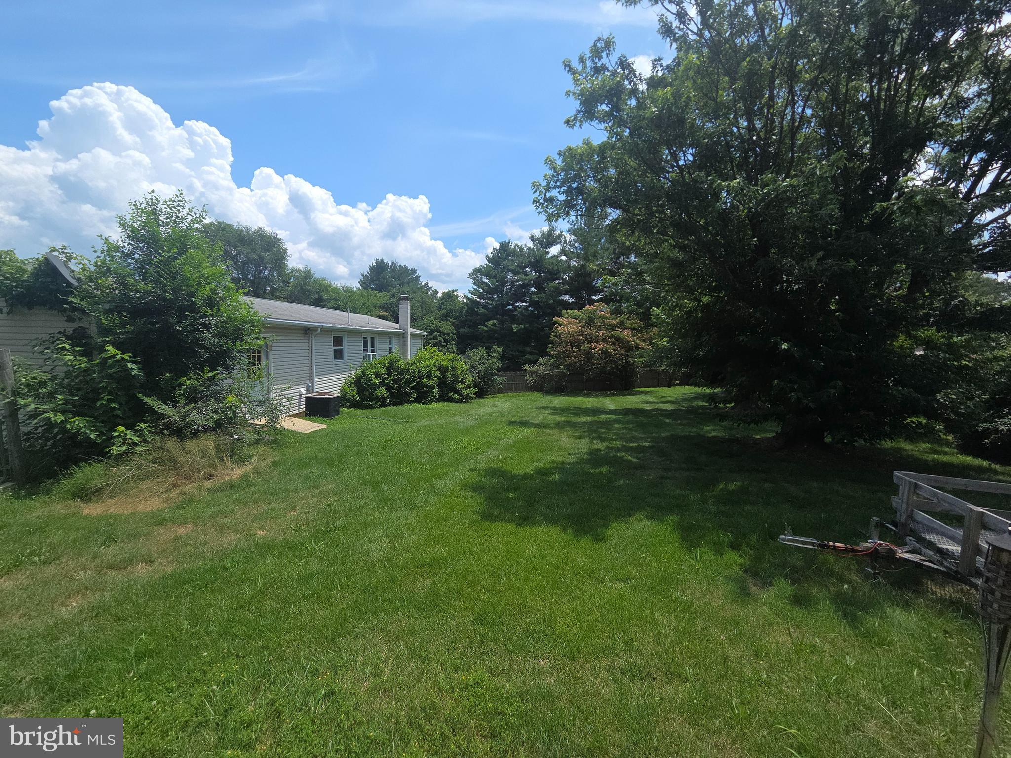 5880 Cardinal Street Mount Jackson, VA 22842 - Photo 5 of 44 a front view of a house with garden