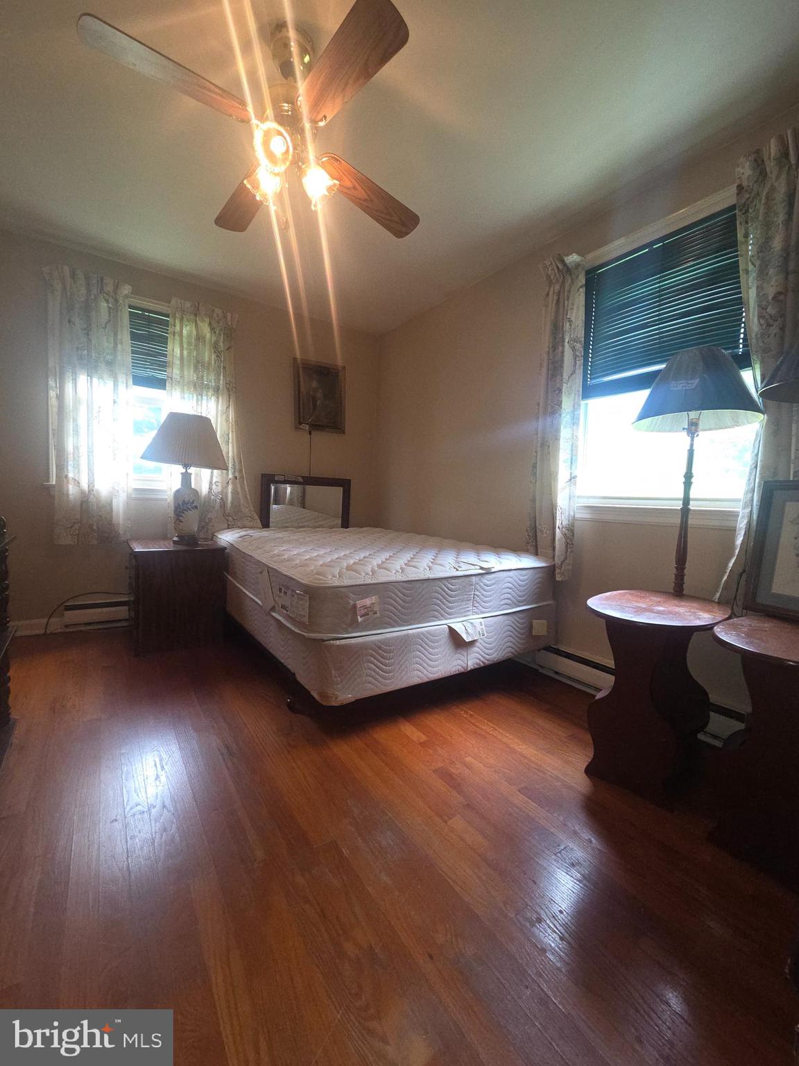 5880 Cardinal Street Mount Jackson, VA 22842 - Photo 10 of 44 a bedroom with a bed and a large window