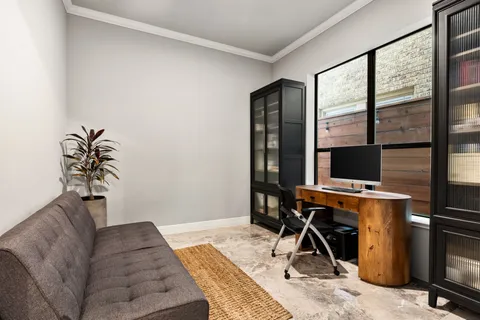 a living room with a couch and a table