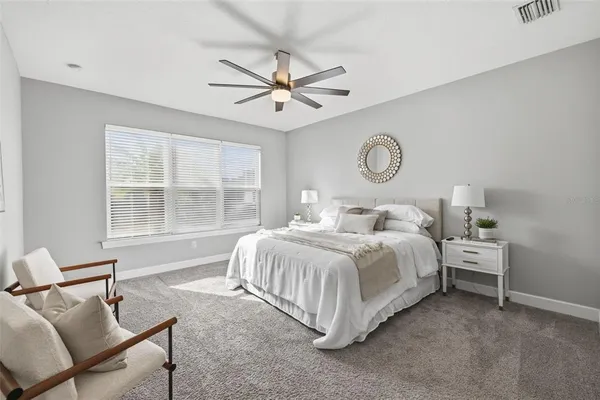 a bathroom with a sink double vanity and a mirror