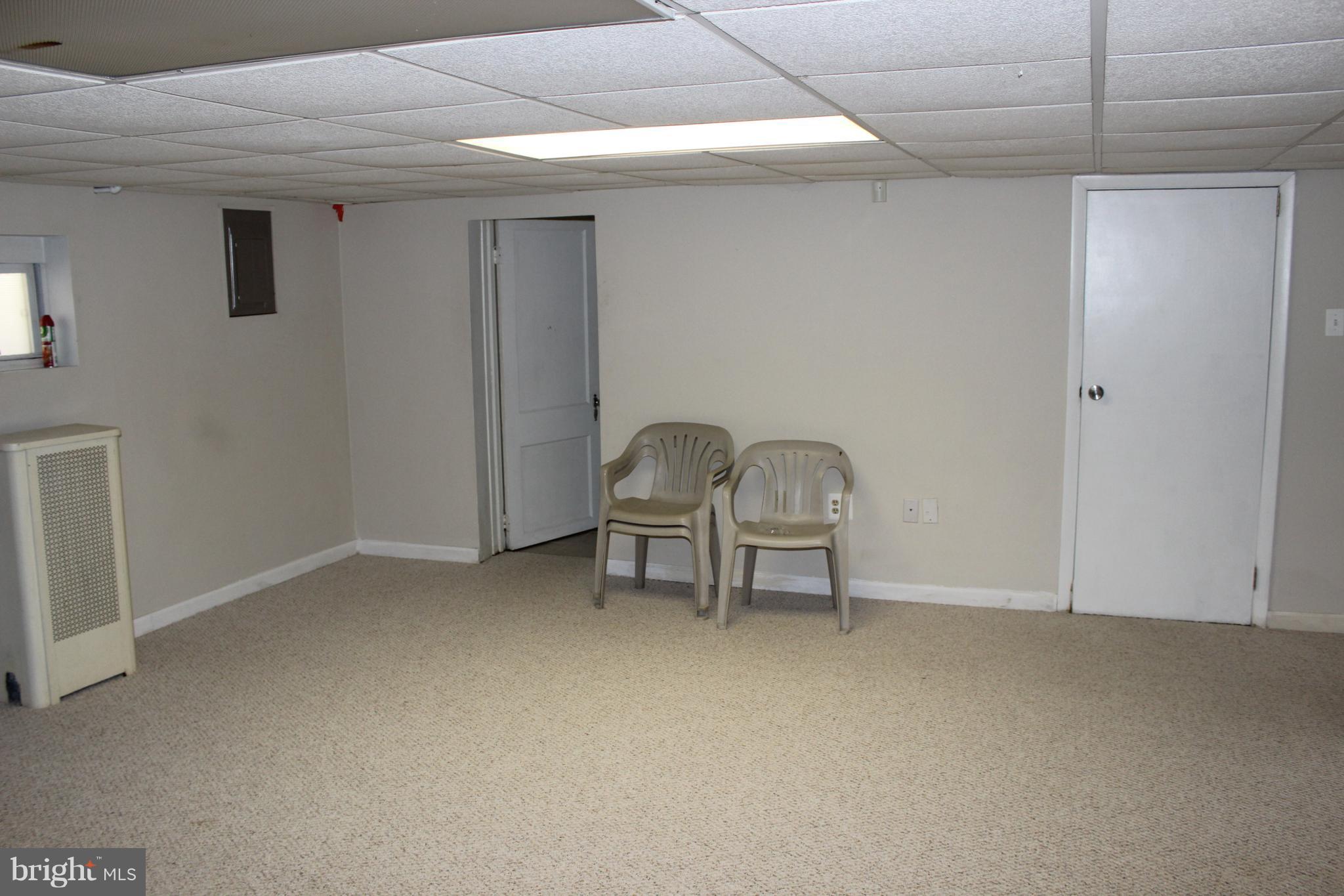 214 Mt De Sales Road Baltimore, MD 21229 - Photo 21 of 29 a view of workspace with a couch