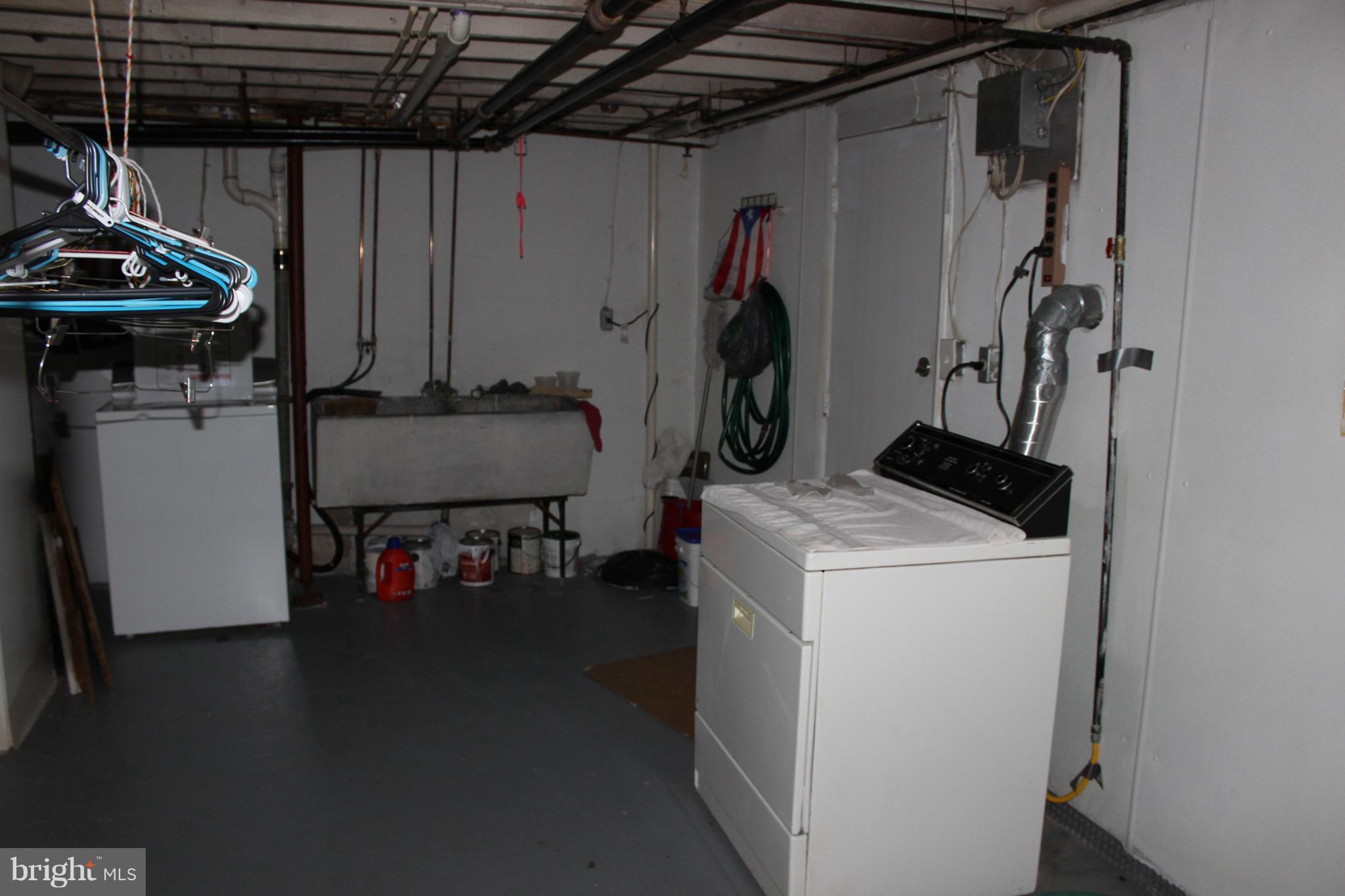 214 Mt De Sales Road Baltimore, MD 21229 - Photo 24 of 29 a utility room with dryer and washer