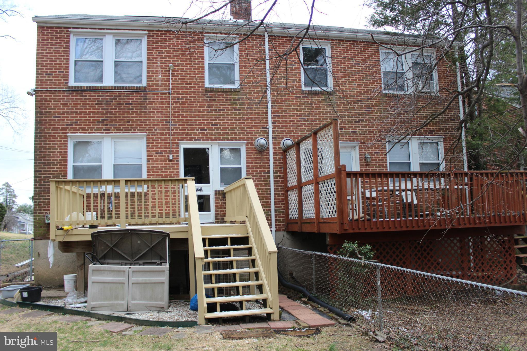 214 Mt De Sales Road Baltimore, MD 21229 - Photo 27 of 29 a front view of a house with a porch