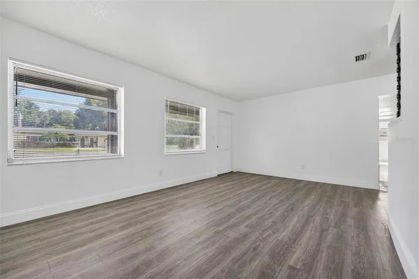 a kitchen with stainless steel appliances a stove a sink and a refrigerator