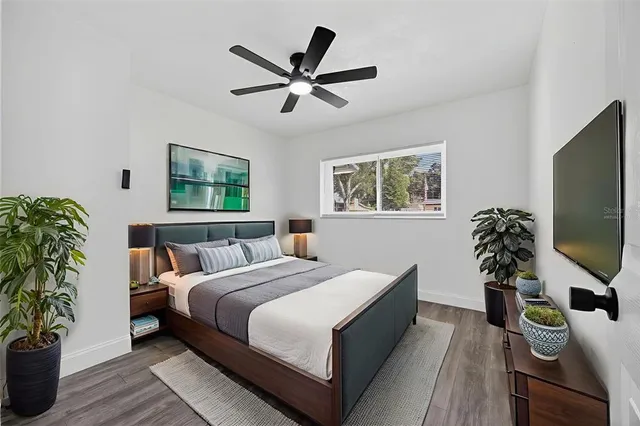 an aerial view of residential houses with outdoor space and swimming pool