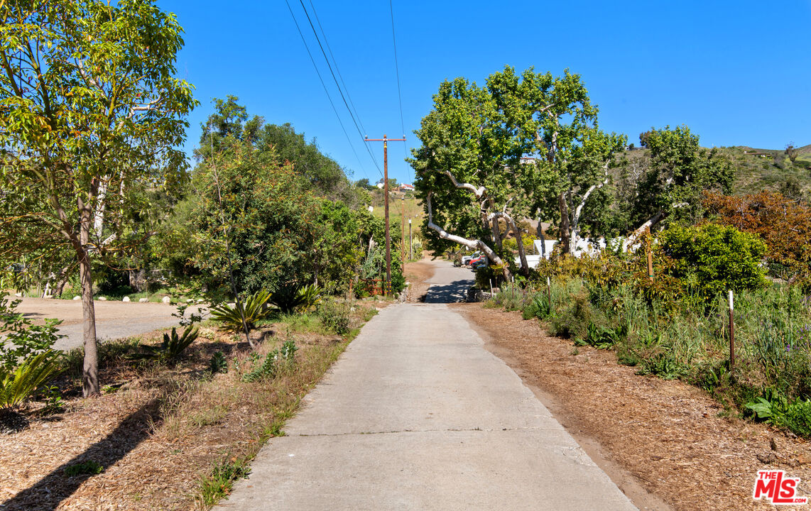 5949 Bonsall Drive Malibu, CA 90265 - Photo 14 of 14 a view of a pathway both side of building