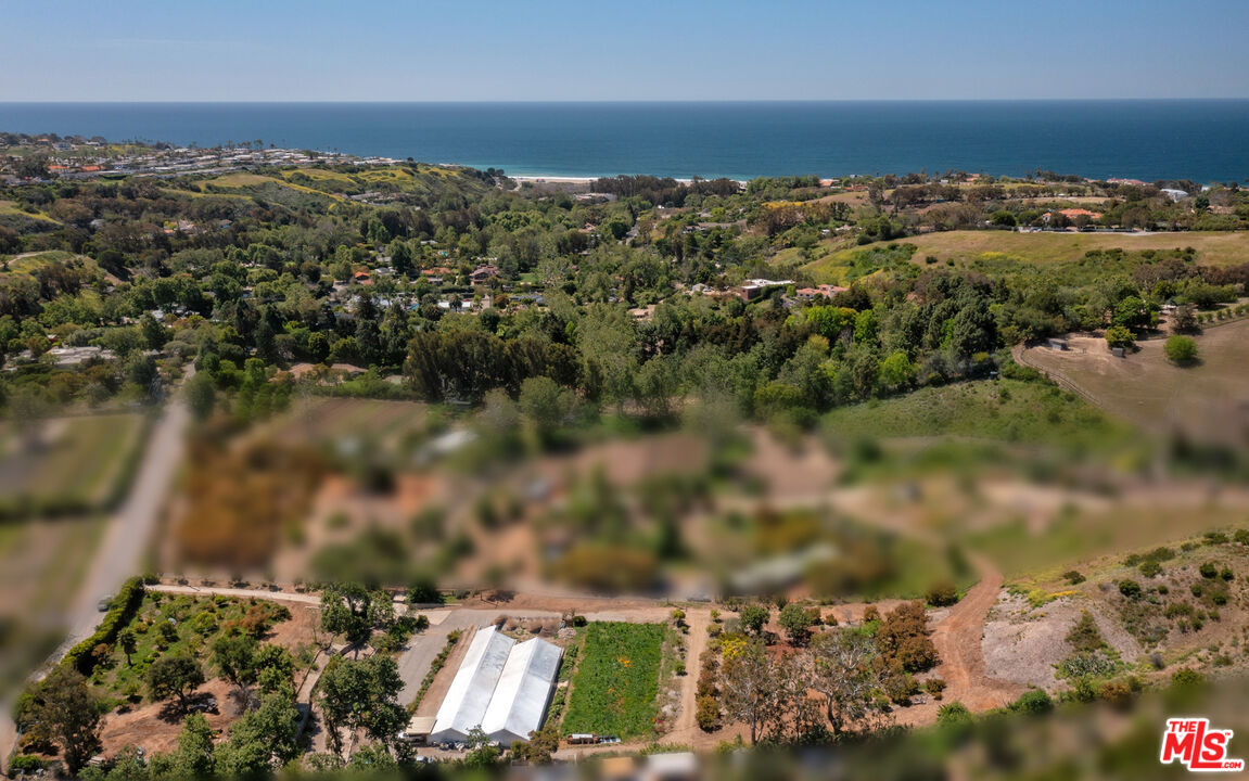 5949 Bonsall Drive Malibu, CA 90265 - Photo 4 of 14 an aerial view of a houses with ocean view