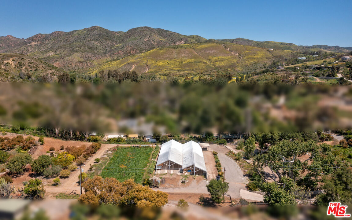 5949 Bonsall Drive Malibu, CA 90265 - Photo 6 of 14 an aerial view of mountain with yard