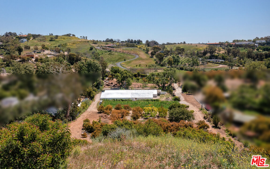 5949 Bonsall Drive Malibu, CA 90265 - Photo 9 of 14 a view of a lake