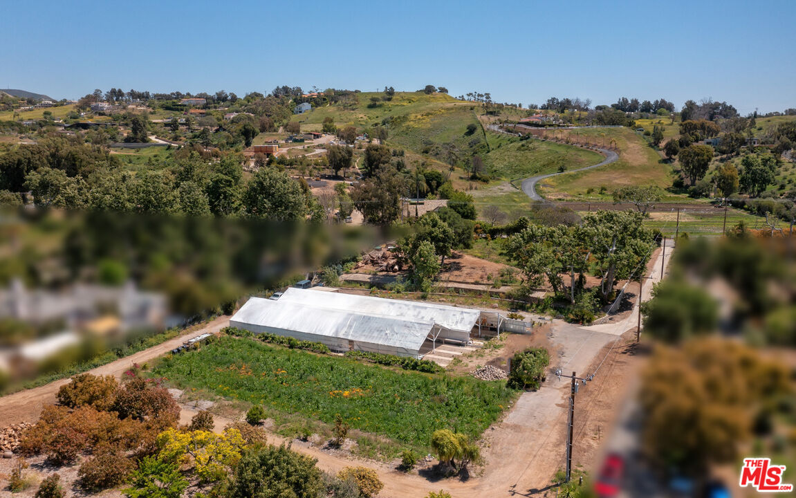 5949 Bonsall Drive Malibu, CA 90265 - Photo 10 of 14 a view of a lake with a city