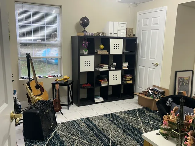 a view of balcony with wooden floor and outdoor seating
